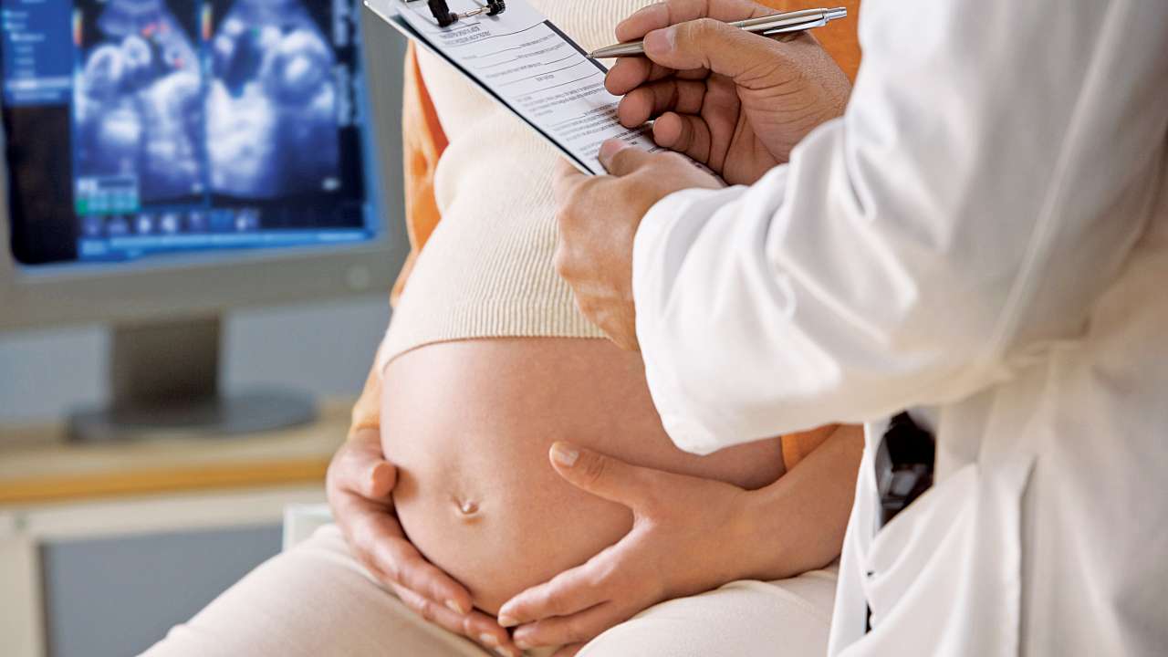 pregnant woman in doctor's office