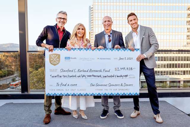 From left) David Spector, chairman and CEO of Pennymac; Sheila Kurland; Dr. Timothy Cloughesy; and Dr. David Nathanson