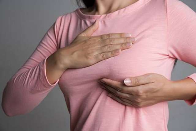 Bruising and dimpling hallmarks of breast hematoma