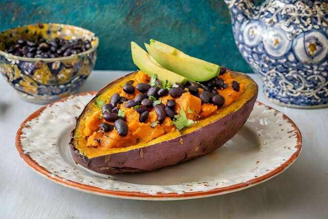 Baked Sweet Potato with Black Beans on a plate