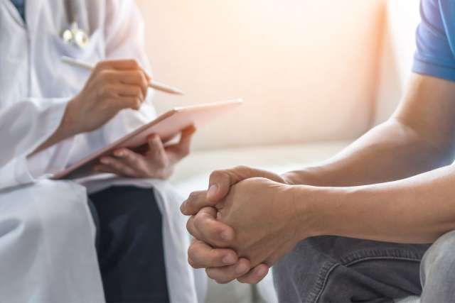 Patient having consultation with a doctor