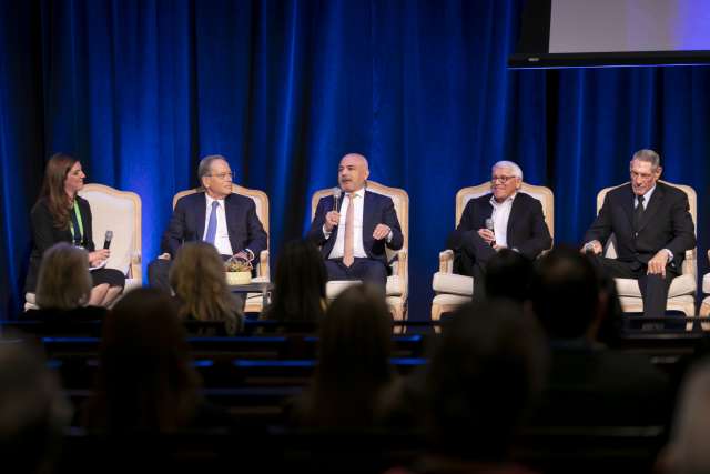 Founders of the California Institute for Immunology and Immunotherapy are interviewed during a panel discussion.