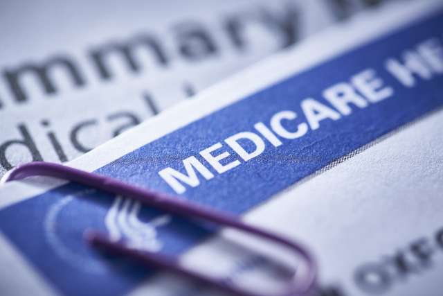 The word Medicare is shown on a form.