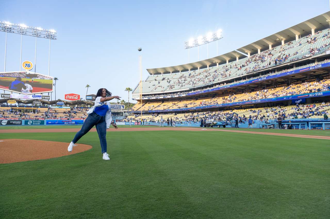 Healthcare All-Star Lakeysha Pack throws out the first pitch at Dodger Stadium.