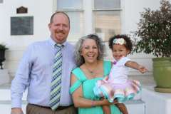 Keona Mock and her parents, Kevin and Tammy Mock, celebrate on Keona's adoption day.