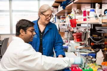  Scientists Samantha Butler and Sandeep Gupta in Butler’s lab at UCLA