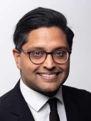 headshot of Sneh Patel in black suit