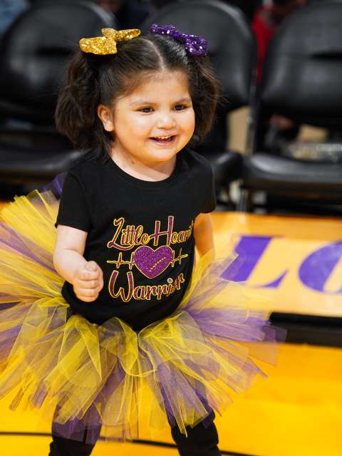 Olivia, a pediatric heart transplant patient at UCLA Health, is celebrated as a Laker for a Day