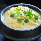 Bowl of Korean steamed eggs topped with green onions