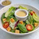Ceasar salad dressing on a salad